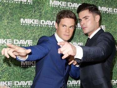 Zac Efron and Adam Devine attend the "Mike and Dave Need Wedding Dates" fan premiere at Event Cinemas Parramatta on July 6, 2016 in Sydney, Australia.