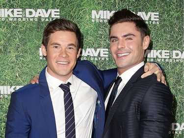 Zac Efron and Adam Devine attend the "Mike and Dave Need Wedding Dates" fan premiere at Event Cinemas Parramatta on July 6, 2016 in Sydney, Australia.