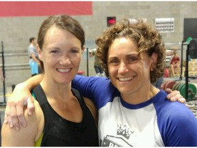 Saskatoon's Laurie Meschishnick and Viki Cirkvencic pose together after their final workout at Synergy Strength and Conditioning in Saskatoon before heading to compete in different masters categories at the CrossFit Games from July 19-24, 2016 in Carson, Calif.