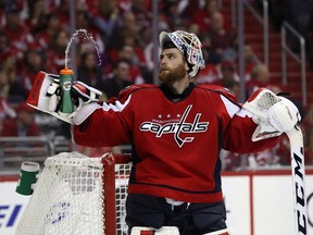 Washington goalie Braden Holtby takes a refresher during an April playoff game against the Philadelphia Flyers.