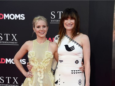 Actors Kristen Bell (L) and Kathryn Hahn attend the premiere of STX Entertainment's "Bad Moms" at Mann Village Theatre on July 26, 2016 in Westwood, California.