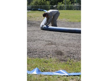 Workers are on site at the Prince Albert water treatment plant preparing for the 30-kilometre waterline that will bring water from the South Saskatchewan River on July 25, 2016.