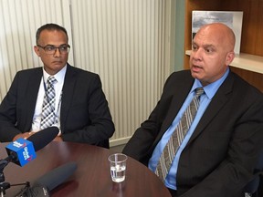 Saskatoon Health Region CEO Dan Florizone, right, and vice-president of finance Nilesh Kavia speak on July 27, 2016, about cost-saving measures at the health region.