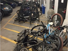 Saskatoon police are investigating how and why dozens of bicycles, in addition to wheels and other bike parts, ended up at two city properties