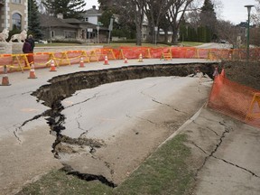SASKATOON, SASK--APRIL 24 2016 9999 News Sask Crescent Erosion- A section of Saskatchewan Crescent East, near 16th Street east, is blocked off after a larger area succumbed to erosion on Sunday, April 24th, 2016. (Liam Richards/Saskatoon StarPhoenix)