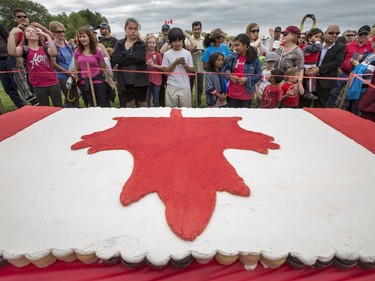Thousands line up for the Canada Day cupcake at the holiday celebration at Deifenbaker Park in Saskatoon put on by the Optimist Club, July 1, 2016.
