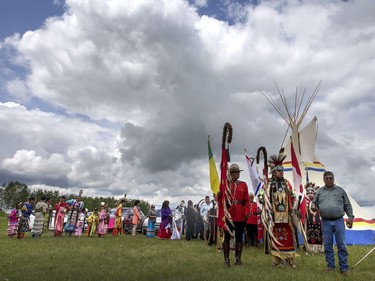 The grand entry at the Robin Cameron, Marc Bourdage 10-year memorial event in Spiritwood, where 10 years ago these two RCMP officers were tragically killed, July 6, 2016.