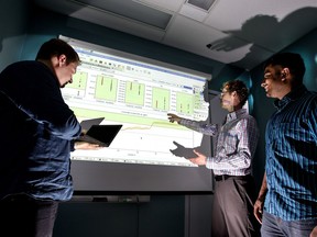 Solido Design Automation employees Jeff Dyck, left, Kris Breen, centre, and Roshan Thomas. Company CEO Amit Gupta says Saskatoon is the perfect spot to build a technology company.