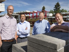 Jonathon Neufeld, Lloyd Postnikoff, Don Neufeld and Mick Neufeld at the yard at J&H Builder's Warehouse.