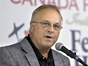 Brian Swidrovich, pictured at a March 2011 announcement in Saskatoon, was fired from the Credit Union Centre in January 2012.