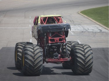 The monster truck "Rock Star" drives down the raceway before the main event at the Monster and Mayhem show at the Wyant Group Raceway in Saskatoon, Saskatchewan on Saturday, July 16th, 2016.