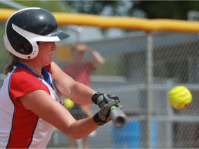 Southeast Steelers' Lydia Niemegeers makes contact during the softball championships against the Tigers on July 17, 2016.