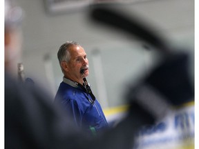 Vancouver Canucks coach Willie Desjardins coaches kids at the Star-Powered Kids on Ice Camp at Schroh Arena in Saskatoon on July 18, 2016.