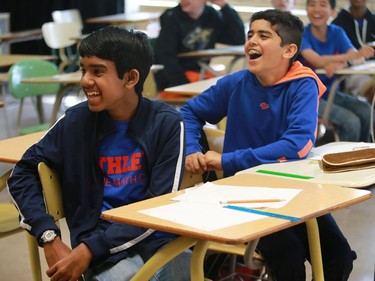 Kennedy Budhanlall and Ishaan Anand solve problems at Extreme Math Camp at Walter Murray Collegiate in Saskatoon on July 5, 2016.