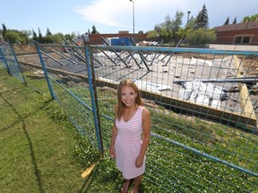 Kelli Fredlund, Co-chair of the Lakeridge Playground Association which raised funds for the playground at Lakeridge School, at the construction site, Tuesday, July 19, 2016.
