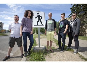 From left to right, U of S computer science prof Kevin Stanley, student Ix Lahiji, U of S geography prof Scott Bell and students Kristof Mercier and Alita Mann on campus Tuesday, July 26, 2016. The group is studying whether how much people walk is affected by where they live, using data collected from mobile phones, but just a few days after the project started, Pokemon Go launched in Canada, which may affect the research. (GREG PENDER/STAR PHOENIX)