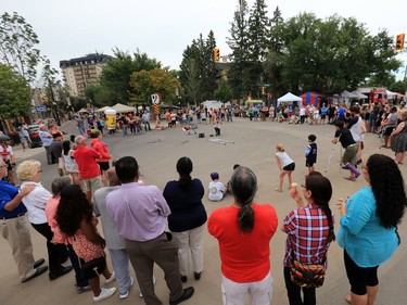 Crowds gather for street buskers during the 2016 PotashCorp Fringe Theatre and Street Festival on Broadway Avenue, July 28, 2016.