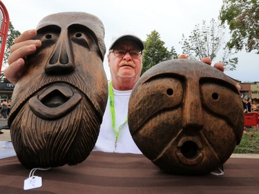 Wayne Sander with some of the handcrafted wooden items he was selling during the 2016 PotashCorp Fringe Theatre and Street Festival on Broadway Avenue, July 28, 2016.