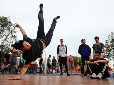 Break dancers perform during the 2016 PotashCorp Fringe Theatre and Street Festival on Broadway Avenue, July 28, 2016.