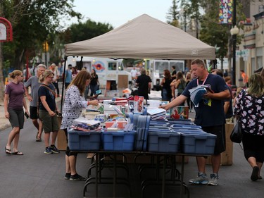 Booths set up for sales during the 2016 PotashCorp Fringe Theatre and Street Festival on Broadway Avenue, July 28, 2016.