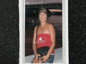 memorial erected to suspicious death victim victim Carol King, in the farmyard where her remains were found northeast of Herschel Monday, December 19, 2011.