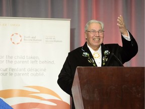 Justice Murray Sinclair greets the audience at the release of the Final Report of the Truth and Reconciliation Commission of Canada on the history of Canada's residential school system, in Ottawa on Tuesday, Dec. 15, 2015.