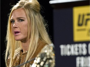 UFC 197 fighter Holly Holm answers a question during a press conference at the MGM Grand in Las Vegas on Wednesday, Jan. 20, 2016.