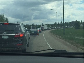 Vehicles were stuck in a traffic jam on the Diefenbaker Bridge as road construction reduced the southbound lanes to one.