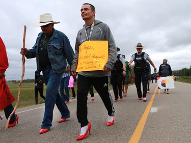 Band councillor Ben Ahenakew and Brett Bird took part in the annual walk for Missing and Murdered Indigenous Women at Ahtahkakoop Cree Nation on August 23, 2016.