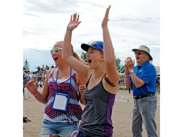 Amy Deck and Jocelyn Kohlman celebrate after winning a game in the 2016 Bunnock World Championship in Macklin, SK over the August long weekend.