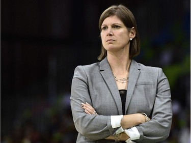 Canada's head coach Lisa Thomaidis looks on during a Women's round Group B basketball match between Canada and Serbia at the Youth Arena in Rio de Janeiro on August 8, 2016 during the Rio 2016 Olympic Games. /