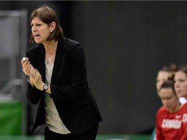 Canada's head coach Lisa Thomaidis gestures during a Women's round Group A basketball match between China and Canada at the Youth Arena in Rio de Janeiro on August 6, 2016 during the Rio 2016 Olympic Games. /