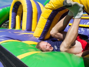 Participants take part in an obstacle course during Motionball Marathon of Sport Saskatoon at Aden Bowman in Saskatoon, SK on Saturday, August 27, 2016.