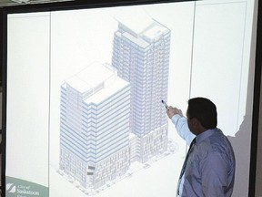 City development manager Darryl Dawson reviews the proposed City Centre Tower at a meeting of the municipal planning commission on Nov. 4, 2014. (Evan Radford, The StarPhoenix