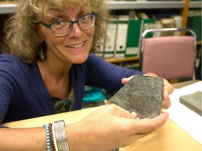 Gabriela Mángano with the body fossil of a tuzoid, a bivalved arthropod. The fossil was found at Stanley Glacier in Kootenay National Park in B.C. Bridges Photo by Bob Florence.