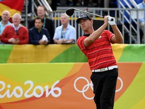Graham Delaet of Canada hits his first shot during the first round of men's golf on Day 6 of the Rio 2016 Olympics at the Olympic Golf Course on August 12, 2016 in Rio de Janeiro, Brazil.