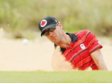 RIO DE JANEIRO, BRAZIL - AUGUST 08:  Graham Delaet of Canada plays a bunker shot during a practice round during Day 3 of the Rio 2016 Olympic Games at Olympic Golf Course on August 8, 2016 in Rio de Janeiro, Brazil.