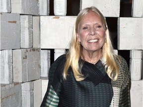 Joni Mitchell arrives to the Hammer Museum's "Gala In The Garden," in Los Angeles, in this Oct. 11, 2014 file photo.