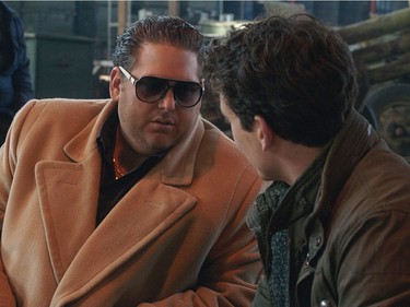 Jonah Hill as Efraim (L) and Miles Teller as David in "War Dogs."
