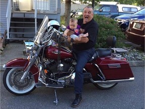 Larry Hemphill with his granddaughter Shae. Larry, who lives in Thailand half the year, was staying in Canada a little longer to celebrate her first birthday.