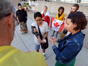 A small group of people gather outside the Provincial Court of Saskatchewan in Regina for a Justice for Colten rally on August 1, 2016. Colten Boushie, a 22-year-old man, was killed near Biggar. Gerald Stanley makes a court appearance in North Battleford charged with second-degree murder in the case.