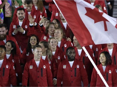 Saskatoon wrestler Jillian Gallays (centre) was all smiles during the opening ceremony for the 2016 Summer Olympics in Rio de Janeiro, Brazil, on Aug. 5, 2016.