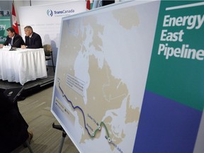 TransCanada Corp. officials discuss the proposed Energy East pipeline project at a news conference in Calgary.