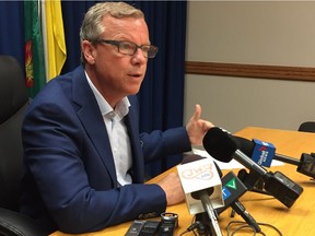 Saskatchewan Premier Brad Wall speaks to reporters on August 19, 2016.