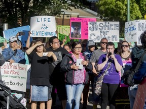 Protesters outside of North Battleford Provincial Court House listen to singers in the middle of a blocked off 100th Street where Gerald Stanley made a court appearance on August 18, 2016.