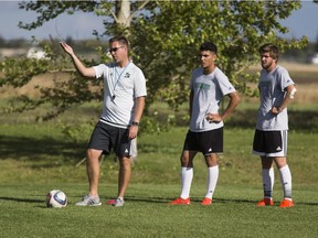 Bryce Chapman, head coach of the University of Saskatchewan men's soccer program, gives out instructions for a drill during practice on Thursday. (GORD WALDNER/Saskatoon StarPhoenix)