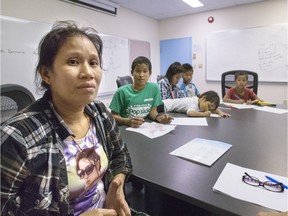 Ma They Yare with her children, left to right, Mor Way Rue, Lah Aye Tha, Ther Nay Lah tltoo, Mor Way Lah and Baw tltoo were at the Saskatoon Open Door Society with her sponsors and a interpreter talk about preparation to enrol her children for the first time into a Saskatoon's school system August 26, 2016.