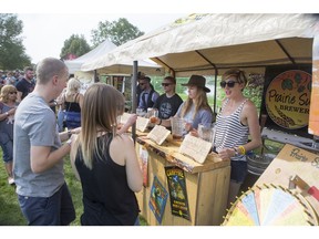 Prairie Sun Brewery serves up beer at YXE Beerfest at Rotary Park on August 29, 2015