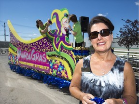 Susan Kozma, Prairieland Park manager of special events stands in front of the park's Mardi Gras float that will take part in the Ex parade. This year's parade will take a new route beginning at the corner of Spadina Crescent East and 24th Street.