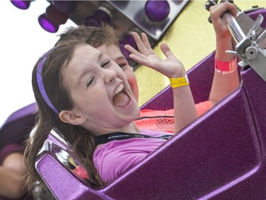 The ride the Orbitor is a scream on the Saskatoon Ex midway, August 9, 2016.